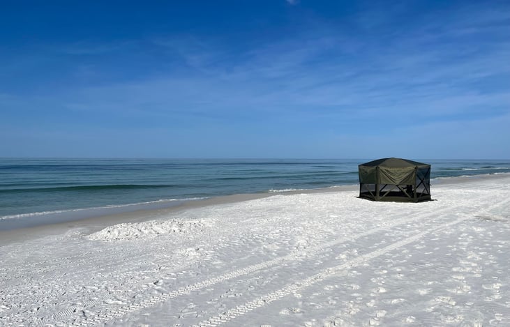 Quick-Set Clam tent. Literally spend all day at the beach!