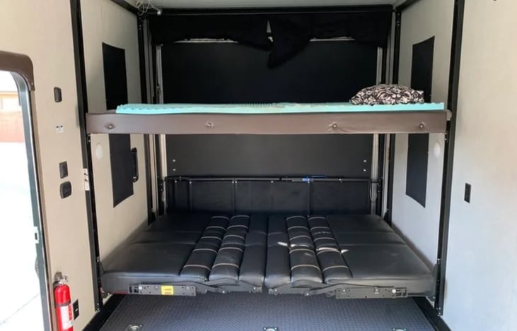 Bench seats can be laid flat either individually or together to make beds that are easy to access. Retractable bunk can be lowered for an extra sleeping area.