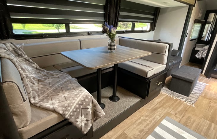 Cozy u-shaped dinette makes full XL bed.