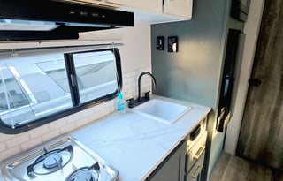 “The Cozy Nook Pet friendly RV Rental”.