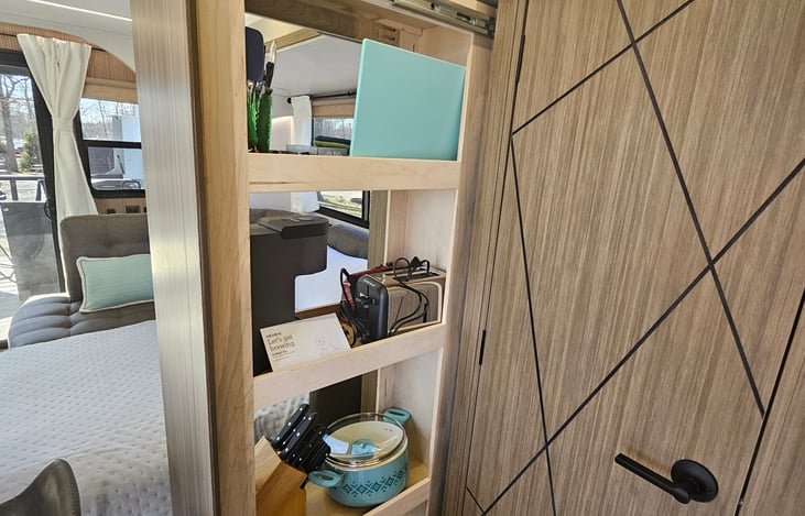 Pull out pantry with appliances, pots, pans and utensils