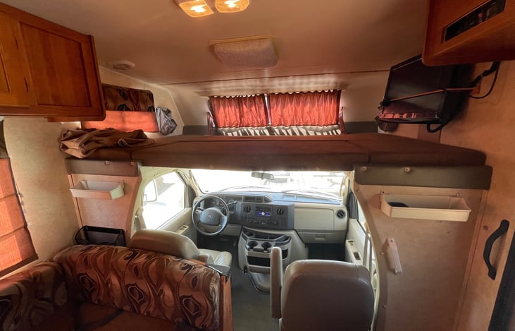 Large over cab bunk can easily sleep two.