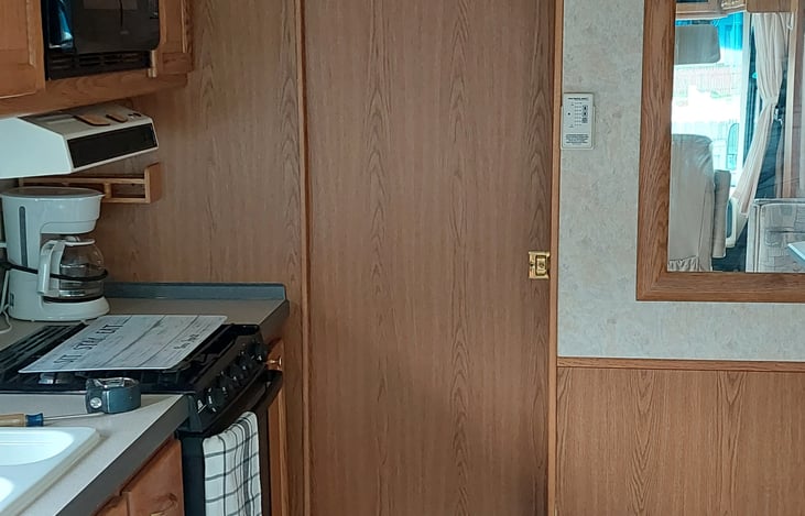 Pocket door separates bath and bedroom.