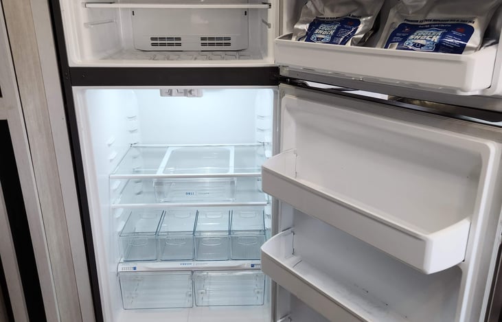 Residential size refrigerator with freezer