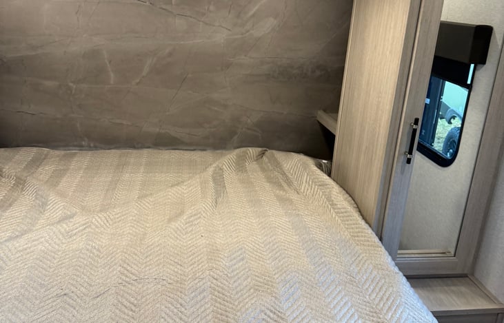 True queen size bed! Bedroom with farm style door! 40 inch tv in bedroom!