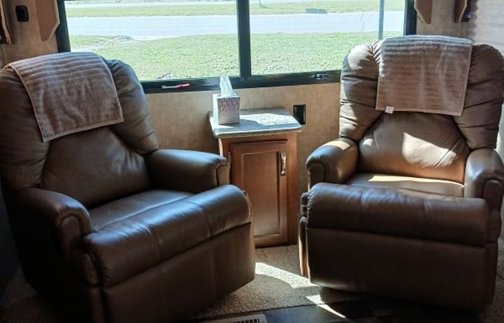 2 recliner chairs with a HUGE rear window.