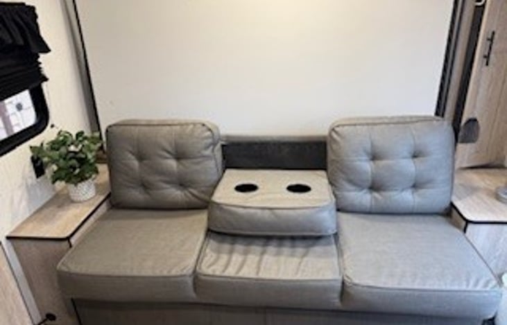 Couch. Master bed pulls down over couch