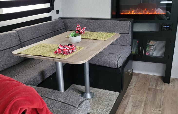 Dinette converts into a queen size bed that sleeps 2 adults