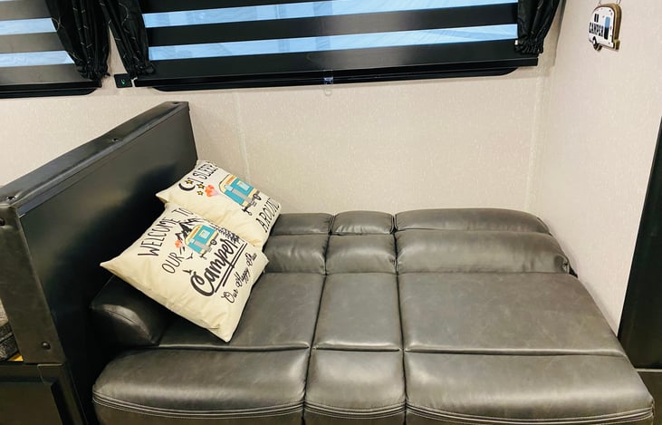 This comfy couch converts to a bed for one adult or two little munchkins!