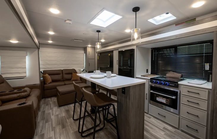 Living Room and Kitchen
Recliners and Flip out Sofa (Full Size)