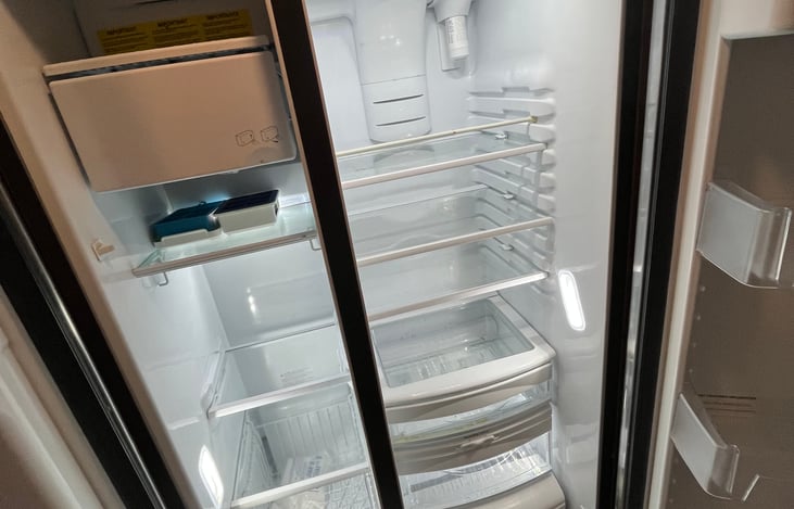 Full size residential side by side refrigerator/freezer.