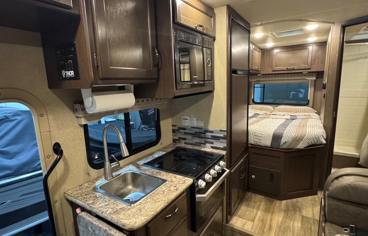 Main cabin area- full kitchen, queen size bed, and full bathroom!