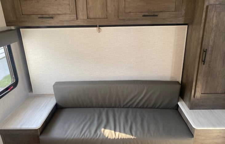 Couch turns into bed.