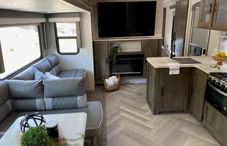 Family room ft. fireplace and 60" smart TV