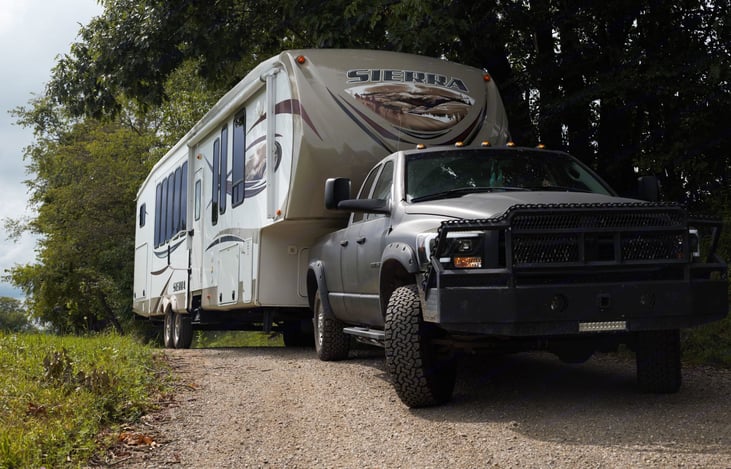Truck Hauling Camper
