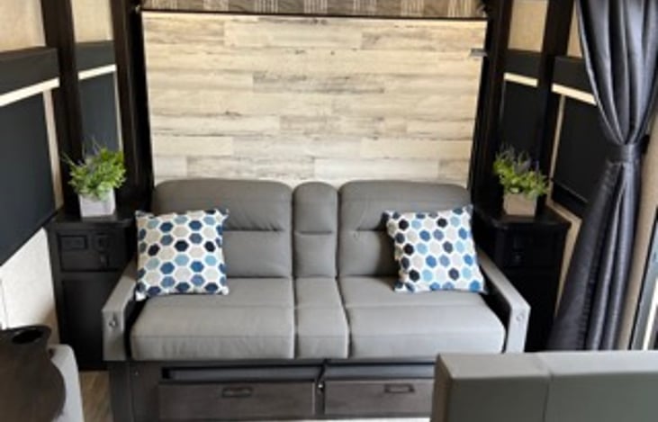 Recliners with USB and plugs on both sides.