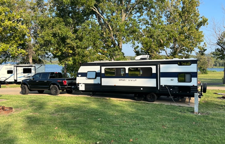Ready-for-adventure campsite setup with camper in place