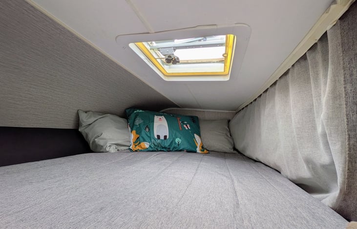 privacy curtain for upper buck with a vent, light and window