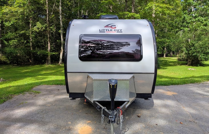 Rugged, cozy and classy, this easy-to-tow 2021 Little Guy Max is loaded with features and accommodations including Rough Rider package, solar, solid wood cabinetry, Queen bed, pop-out windows & more.