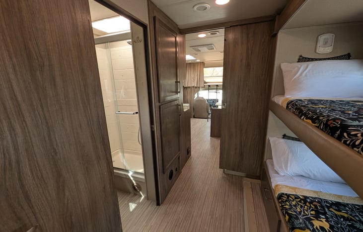 Smart floor plan showcases excellent flow from bunks to bathroom to living area. Full bathroom with shower provides convenience for the whole family.