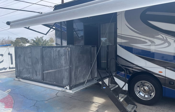 The side patio is great for hosting (might have been used as a DJ booth once or twice), and provides access up the stairs to the garage.
