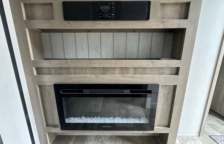 Electric fireplace for additional warmth and ambience.