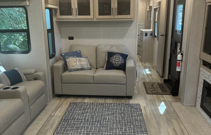 Loveseat with pull out full-size bed. Linens supplied.