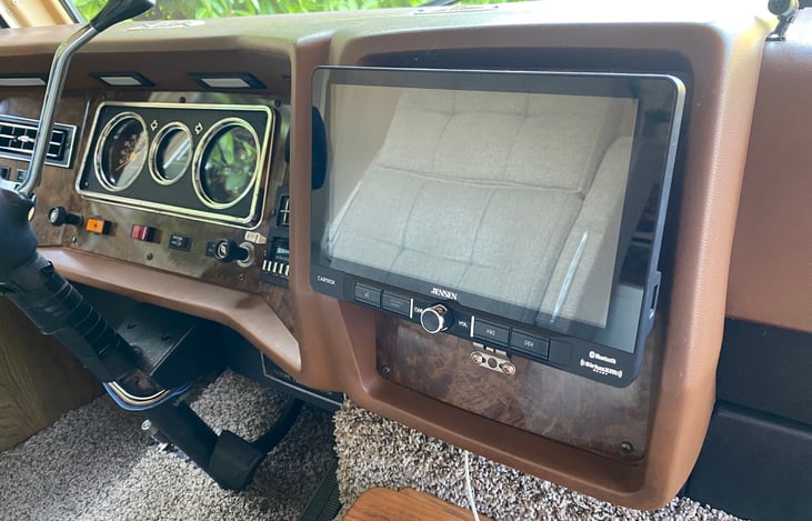 Vintage but updated with modern tech so that you can navigate and use apps.