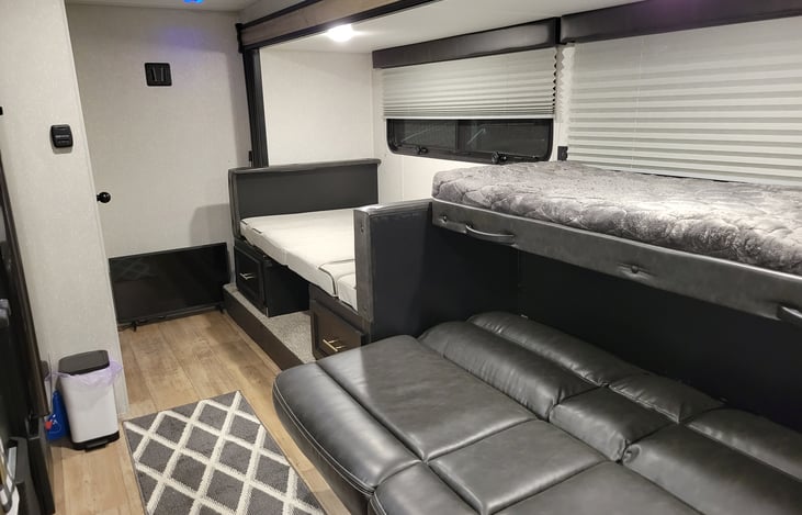 Couch Converted to bunk and Dining room table converted to bed