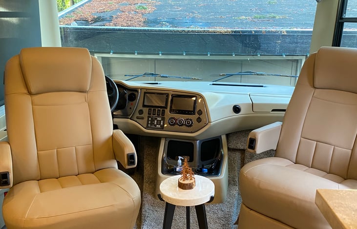 Captain chairs reverse and electric foot rest