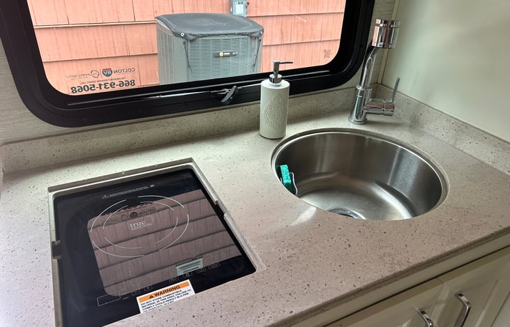 Full kitchen sink with induction stove