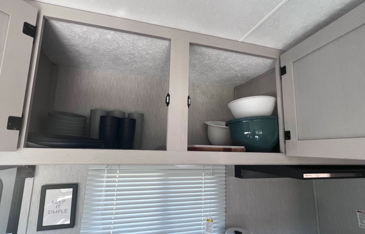 Overhead Cabinet and Provided Dishes