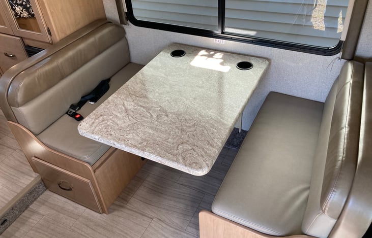 Dining area that converts to a 42" wide x 72" long bed.