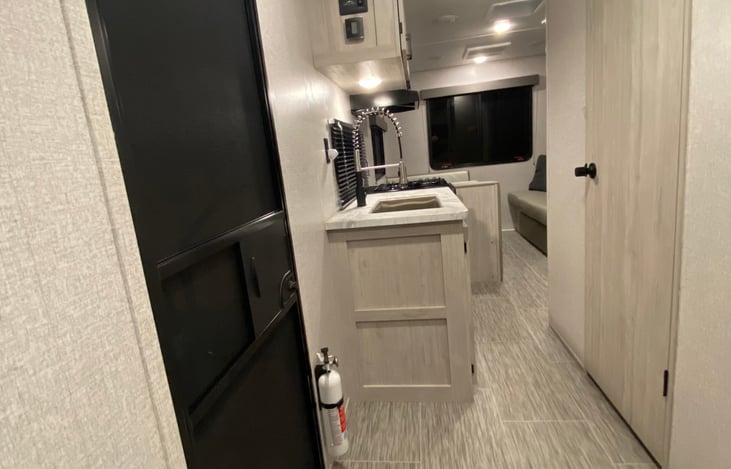 View (from the bedroom) of the dining area at the rear of the camper.