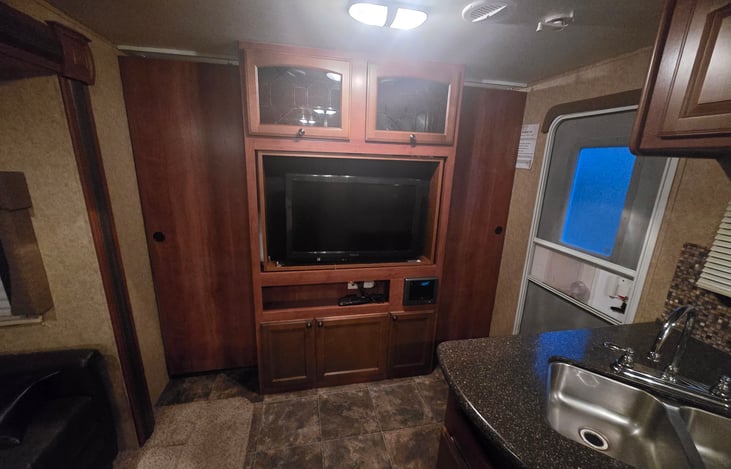 Pocket doors come out for master room privacy.
TV also flips around so you can watch Movies in bed.