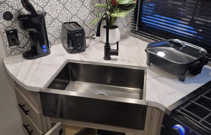 Toaster, electric skillet and single serve coffee machine also included.