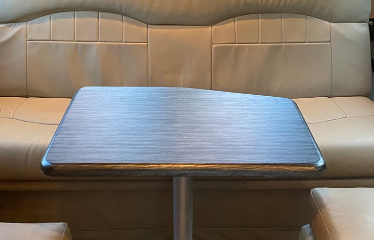 Removable table for rear lounge or front seating area.