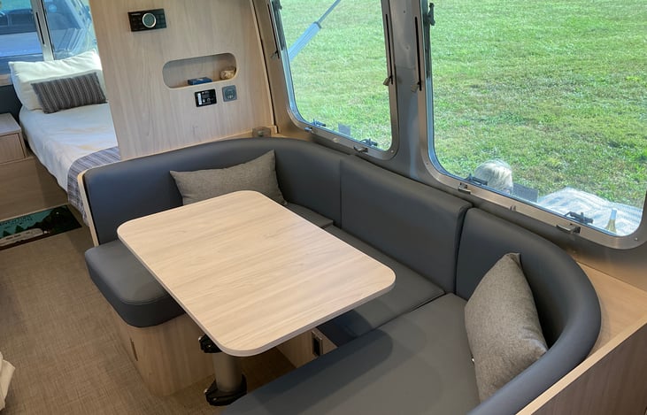 Dinette folds down to create a single bed.