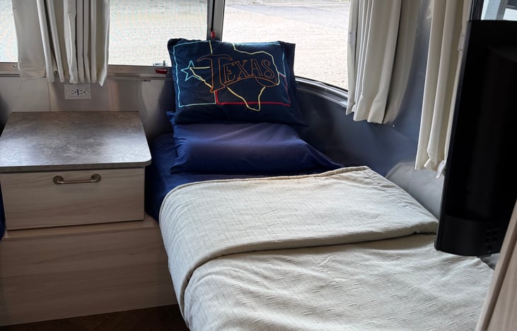 The twin beds mean there is a center aisle that makes getting in and out of bed easy.