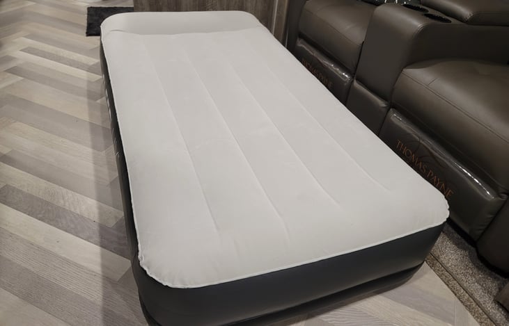 Air mattress included.