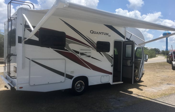 Retractable awning offers shade from the sun while enjoying the great outdoors or  while you are relaxing or having a meal under the awning