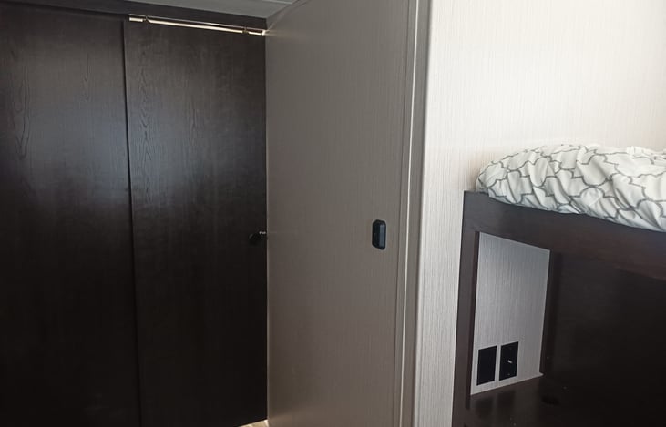 Backroom showing the door completely closed for privacy