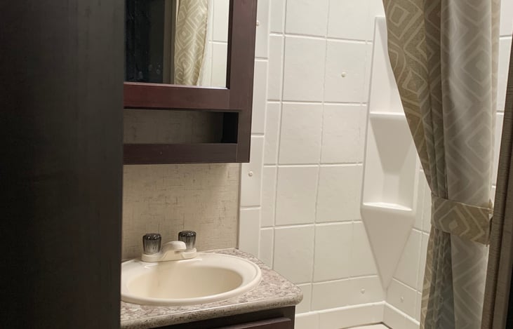 Bathroom with deep bathtub for the small kids baths.