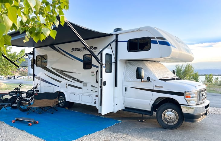 Outdoor rug, seating for 6, and a gas grill are included for your outdoor setup.
