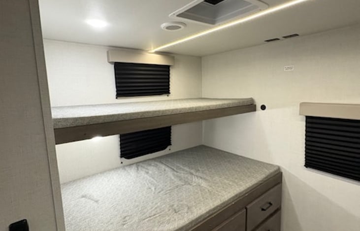 Room for everyone to rest and recharge (left side of private bunkhouse).