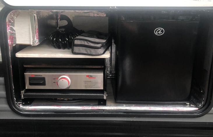 Outside Grill top and Small Refrigerator