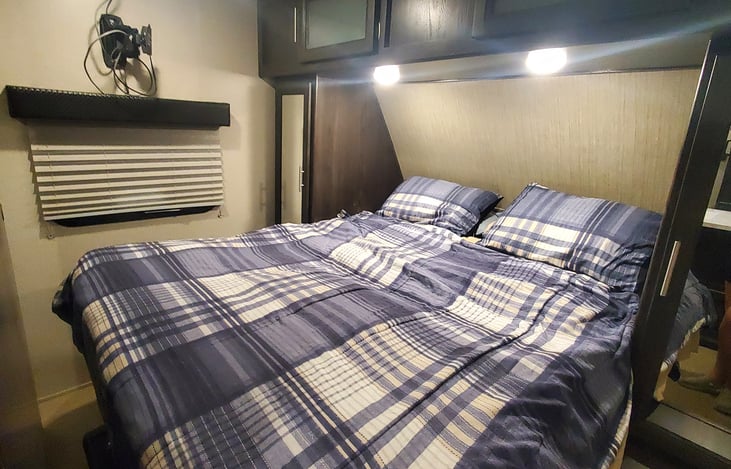 Master Bed w/ plenty of closet space.