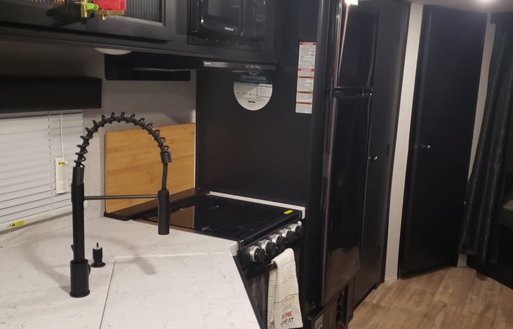 Farm style sink will lots of counter space.