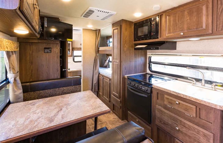 All the cooking and dining room you need for a family adventure. Dinette pops down for additional sleeping area