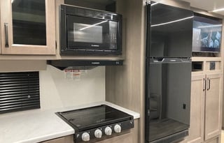 His and Her BathRooms--2024 Grand Design 321BH